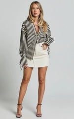 Pieta Mini Skirt - Recycled Cotton Raw Hem Denim Skirt in Ecru