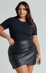 Ashlyn Mini Skirt - Faux Leather Overlap Skirt in Black