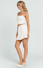 Karlene Mini Skirt - Tulip Shape Pocket Flap Skirt in White