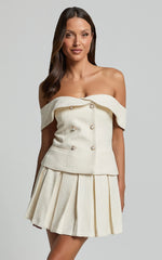 Maggie Mini Skirt - Pleated Mid Rise Boucle Skirt in Cream
